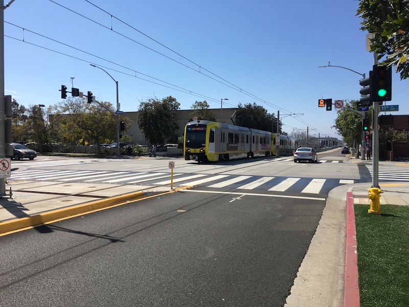 Currently trains and cars travel through the intersection together. Cars are prohibited from making left turns.